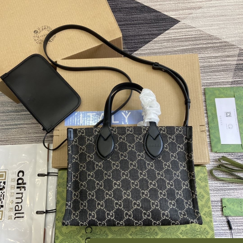 G*u*i shopping bags
